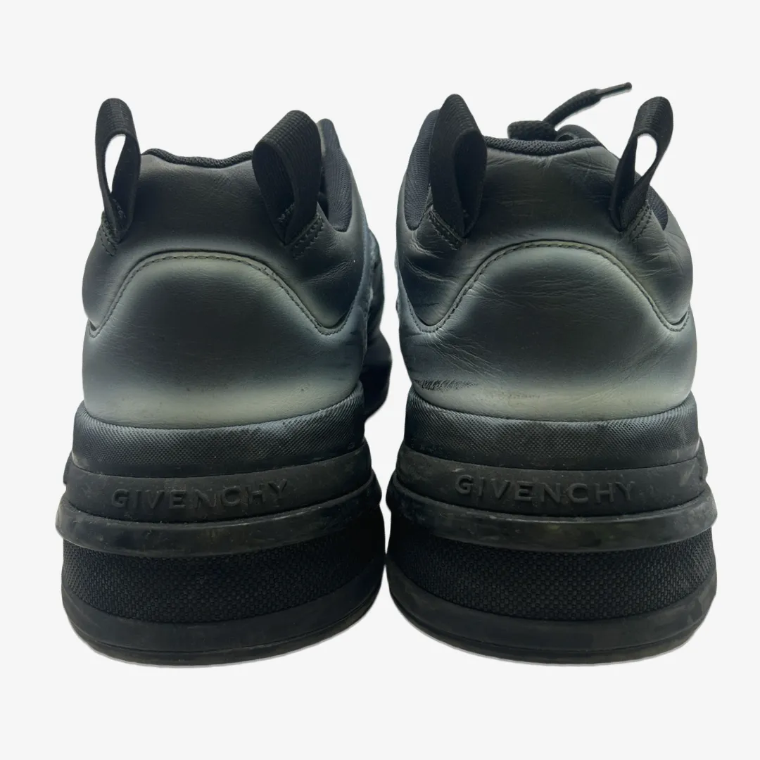 Givenchy men's black leather sneakers with white spray-paint effect